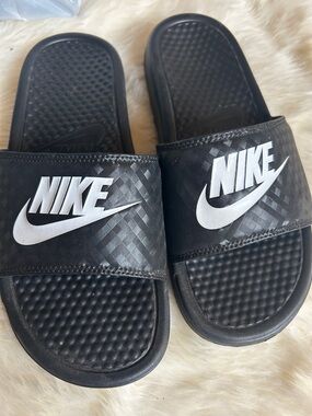Nike Black Slides with White Swoosh Logo